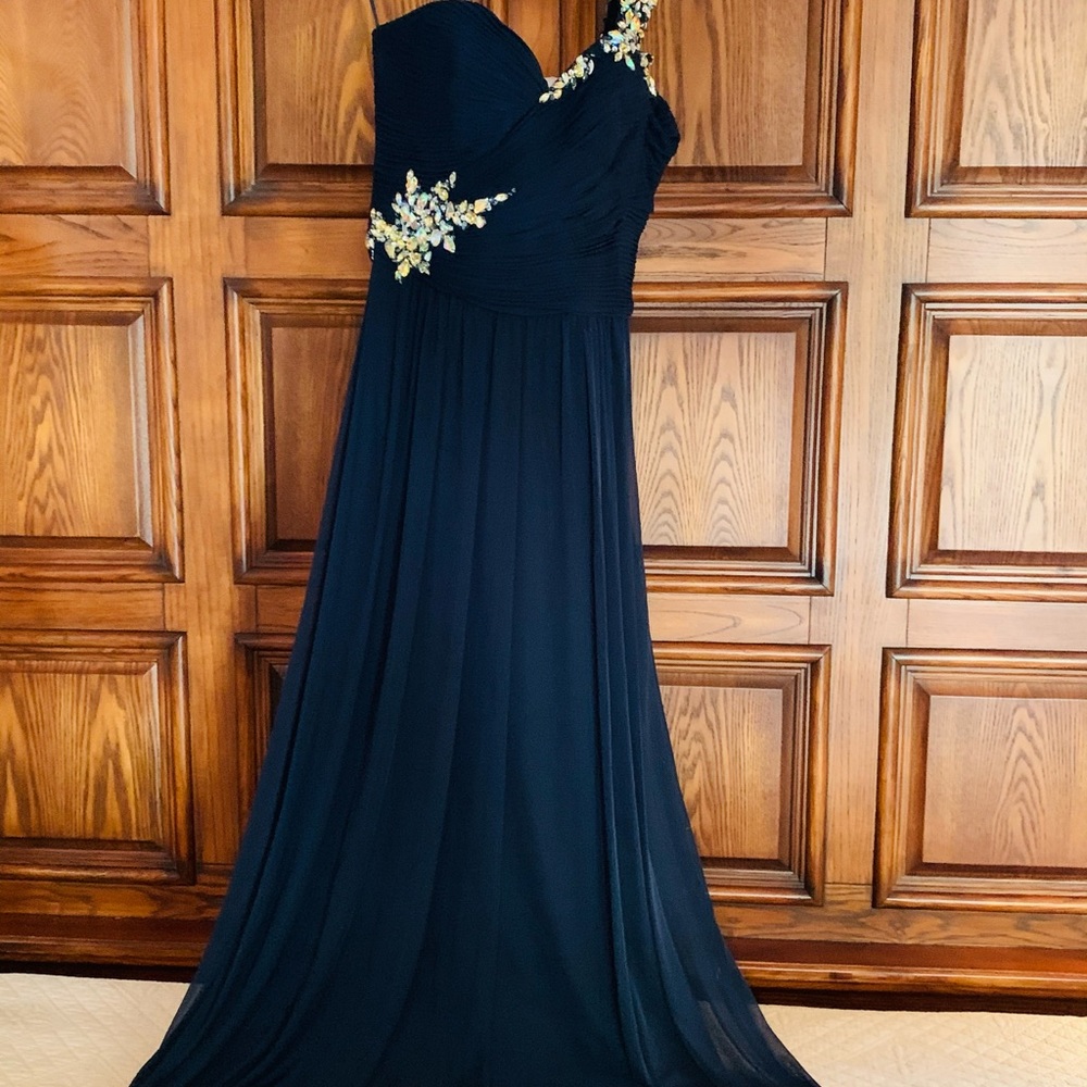 Navy blue shoulder strap gown with ornaments